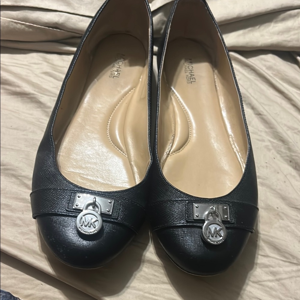 Michael Kors Black Flats with Medallion Detail